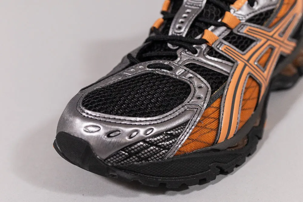 ASICS GEL-NIMBUS 10.1 'Black and Rust Orange' - 1203A543.004 running in synthetic tracks shoes