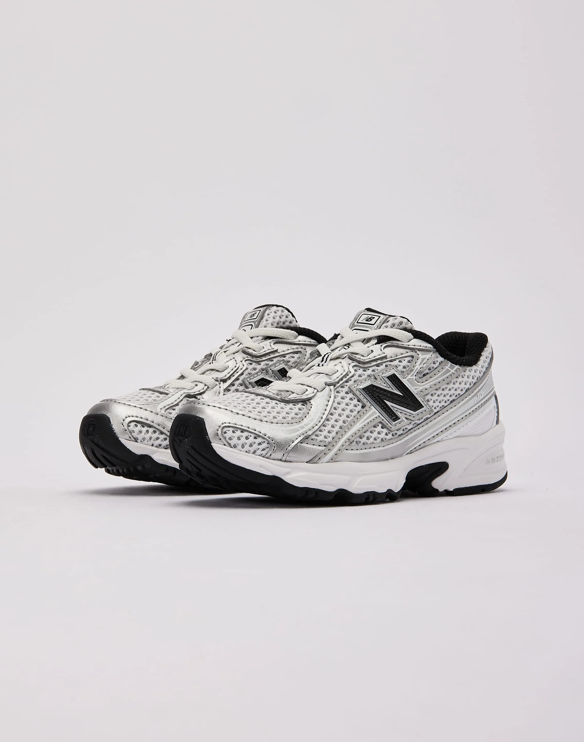 Muddy running grip New Balance 740 Bungee Pre-School