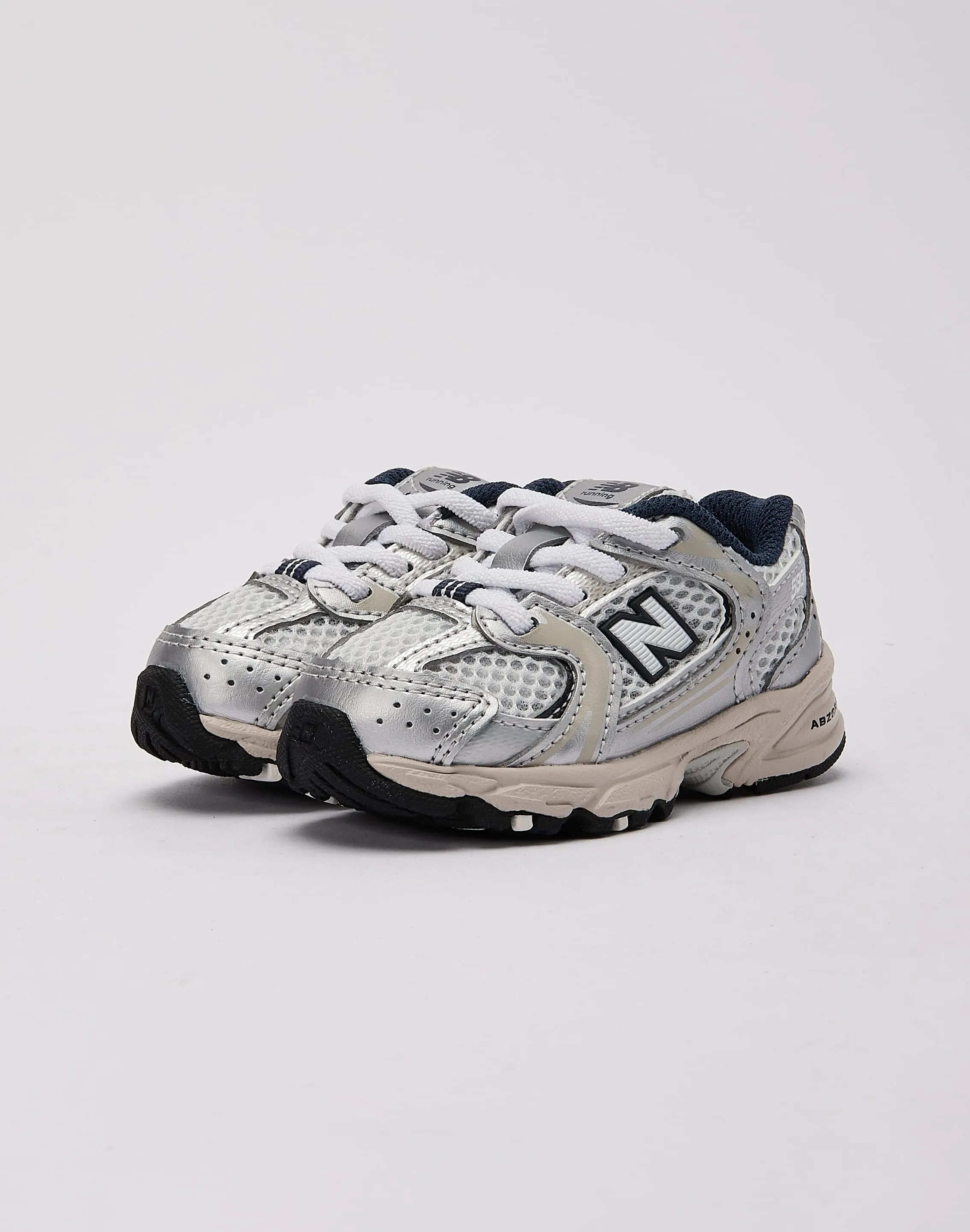 sporty shoe appeal Rainy day run New Balance 530 Bungee Toddler