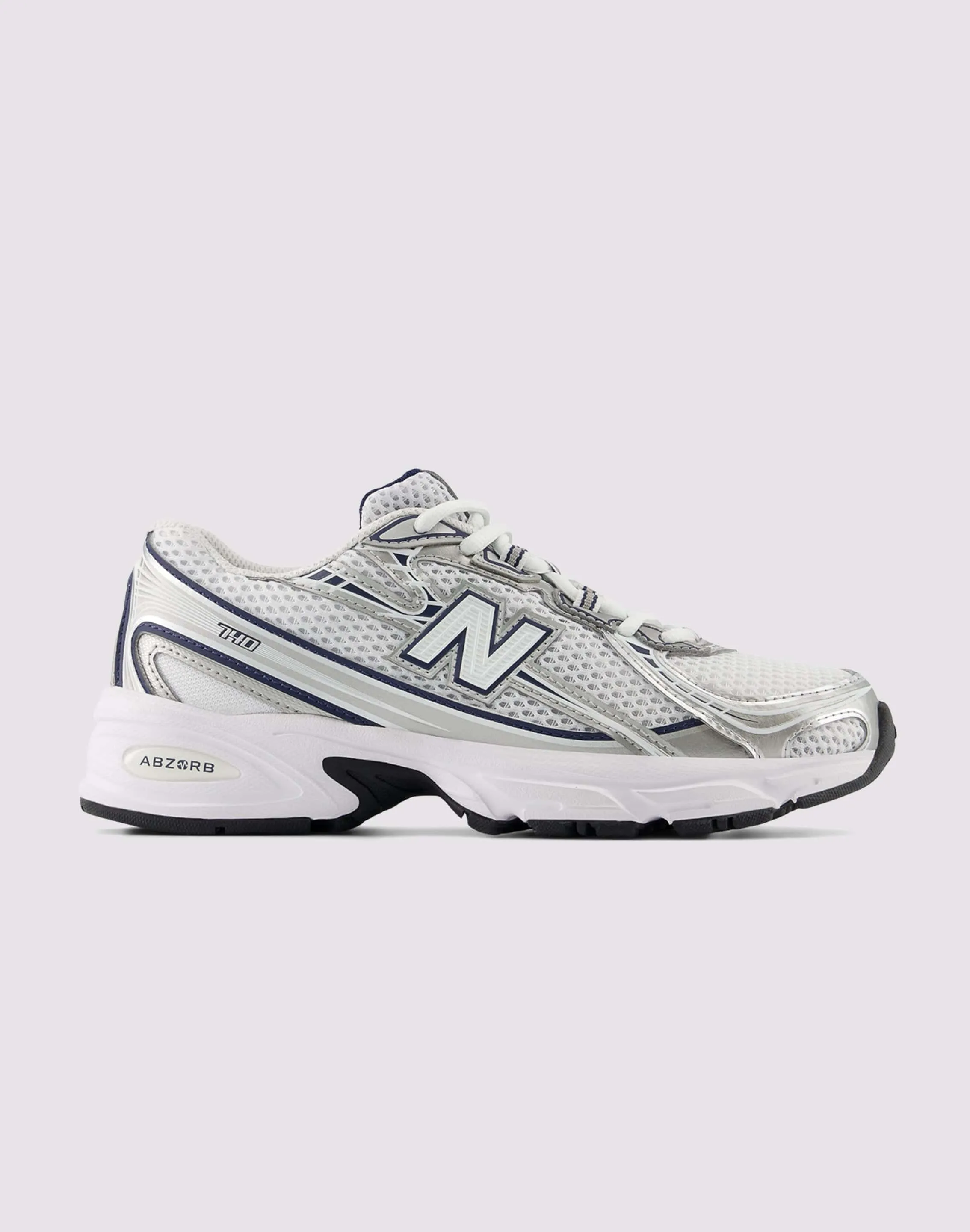 New Balance 740 Grade-School anatomical - shape shoes running in a city park shoes