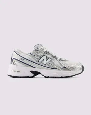 New Balance 740 Grade-School anatomical - shape shoes running in a city park shoes