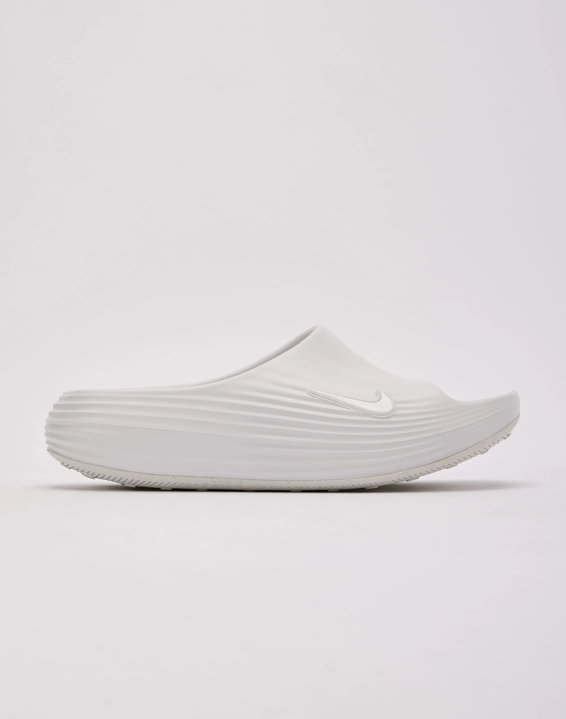 Nike ReactX Rejuven8 Slides Wear ease Friction control