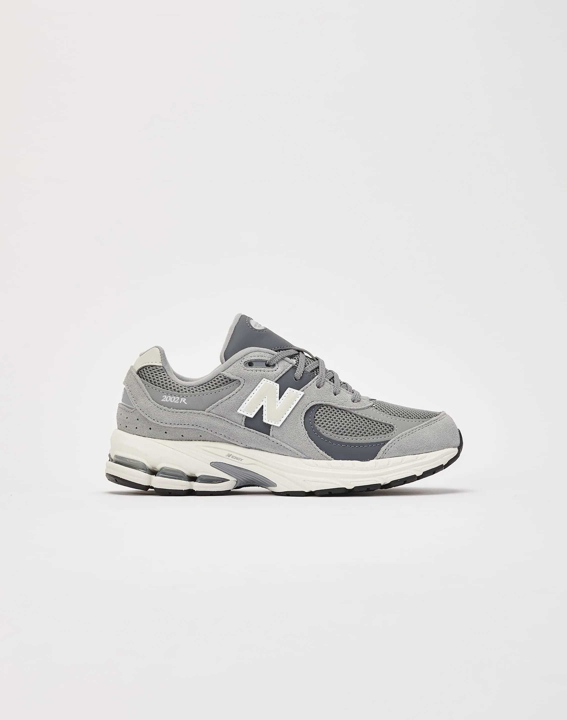 running in a park shoes Lockdown Strap New Balance 2002R Grade-School